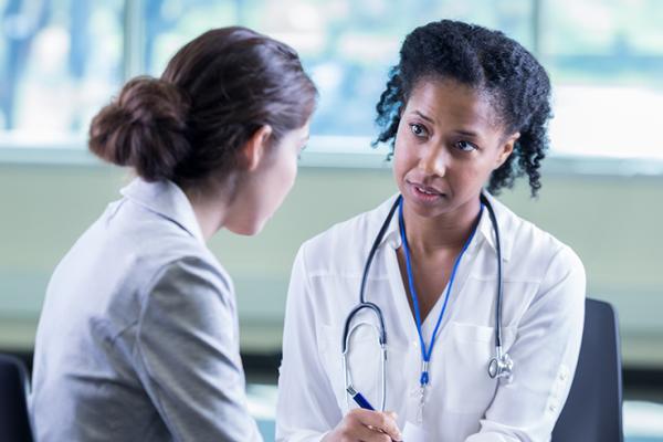 doctor and patient discussing breast cancer