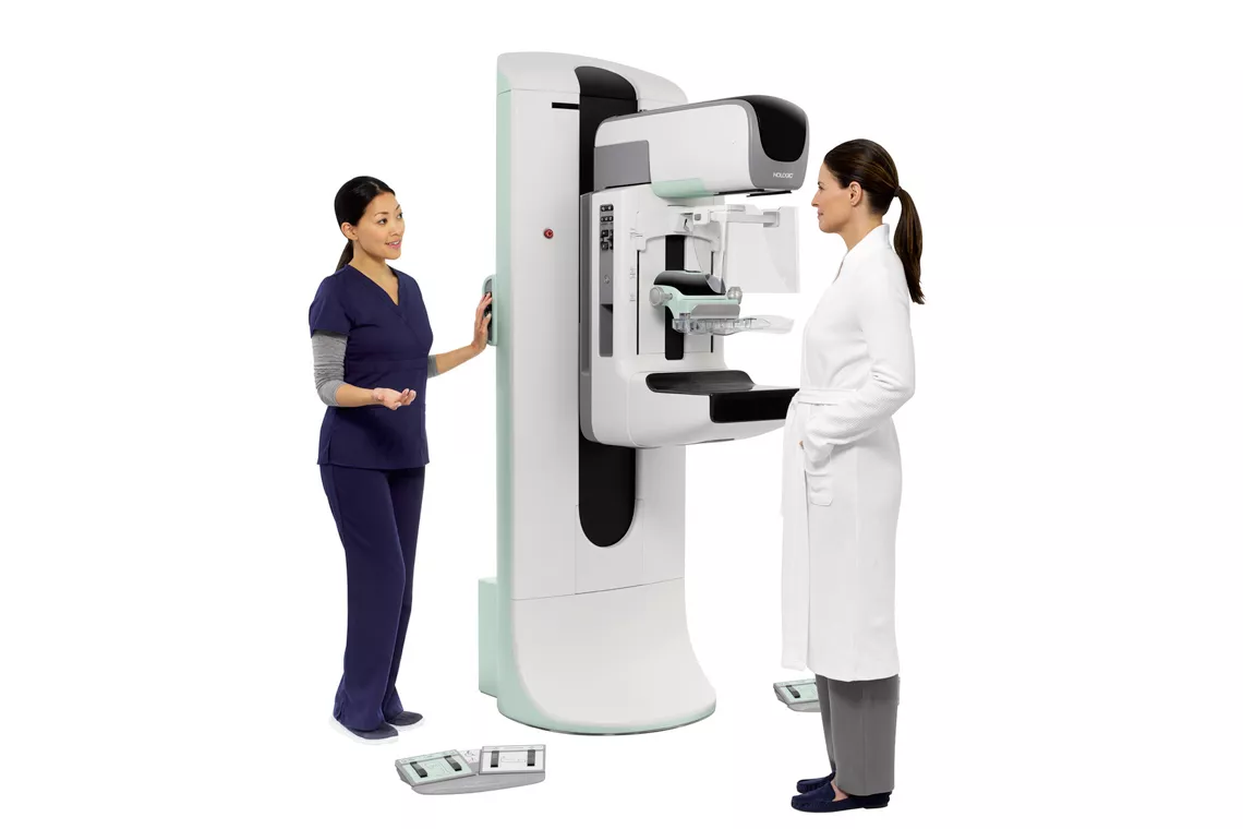 Medical 3D imaging machine with technician and healthcare professional