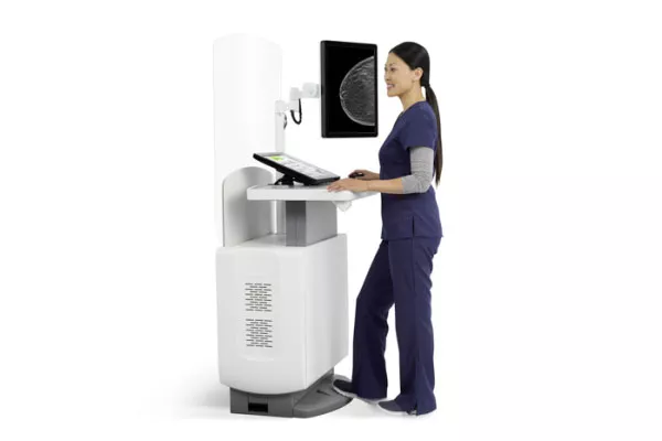 Radiologist reviewing a mammography on a screen. 